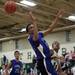 Pioneer senior Tevis Robinson watches a loose rebound on Tuesday. Daniel Brenner I AnnArbor.com